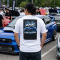 KMR Car Culture Tee — Racing Graphic T-Shirt with Blue Sports Car & Checkered Flags